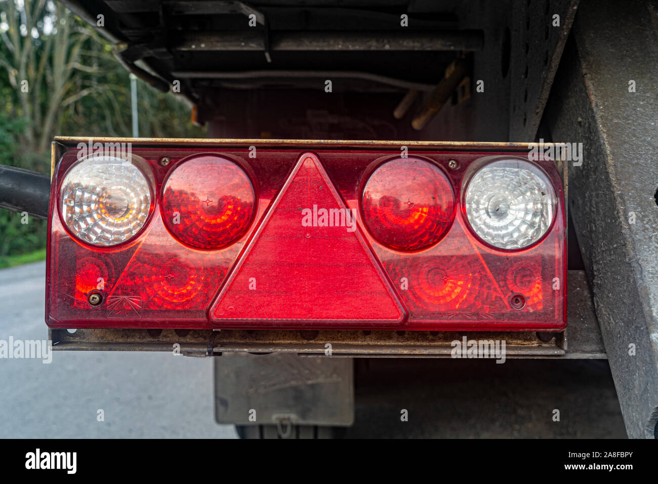 rear stop signal on truck trailer closeup Stock Photo