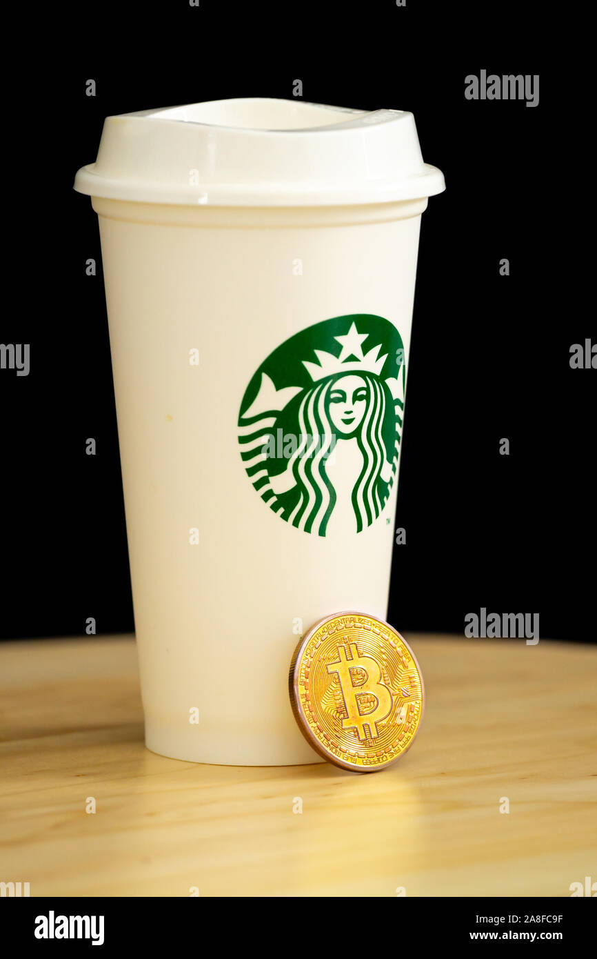 SLOVENIA, LJUBLJANA - OCTOBER 30 2019: Cryptocurrency Bitcoin with Starbucks  coffee cup Stock Photo - Alamy