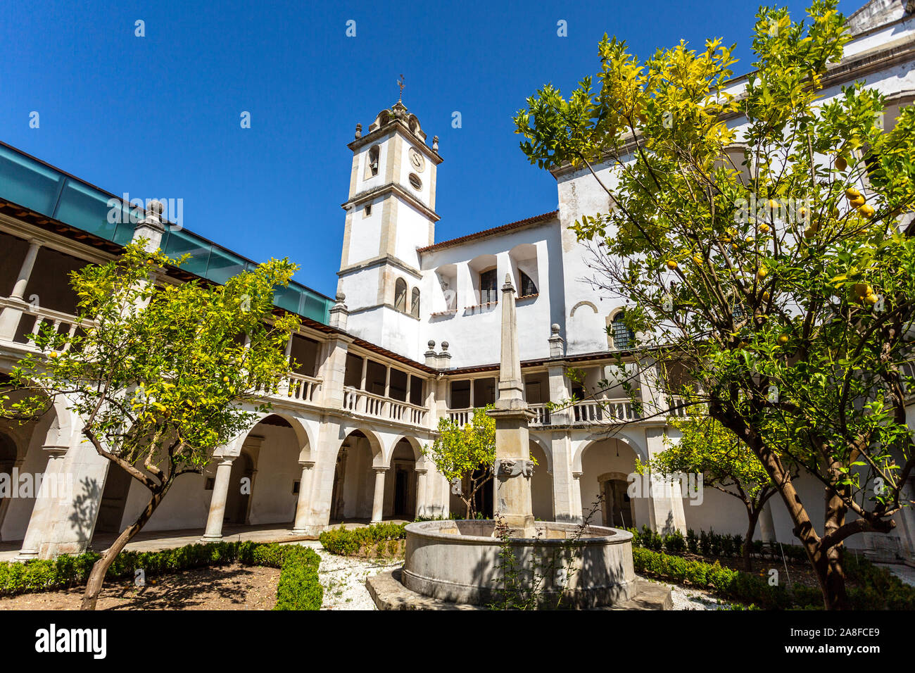 View of the Renaissance cloister with roman arches and Doric columns of the Monastery of Saint Mary of Lorvao, Coimbra, Portugal Stock Photo
