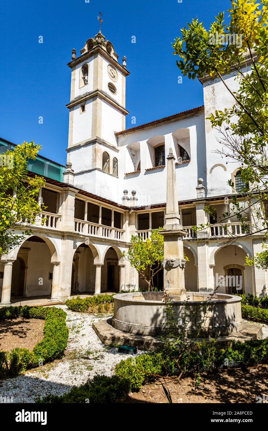 Vertical view of the Renaissance cloister with roman arches and Doric columns of the Monastery of Saint Mary of Lorvao, Coimbra, Portugal Stock Photo