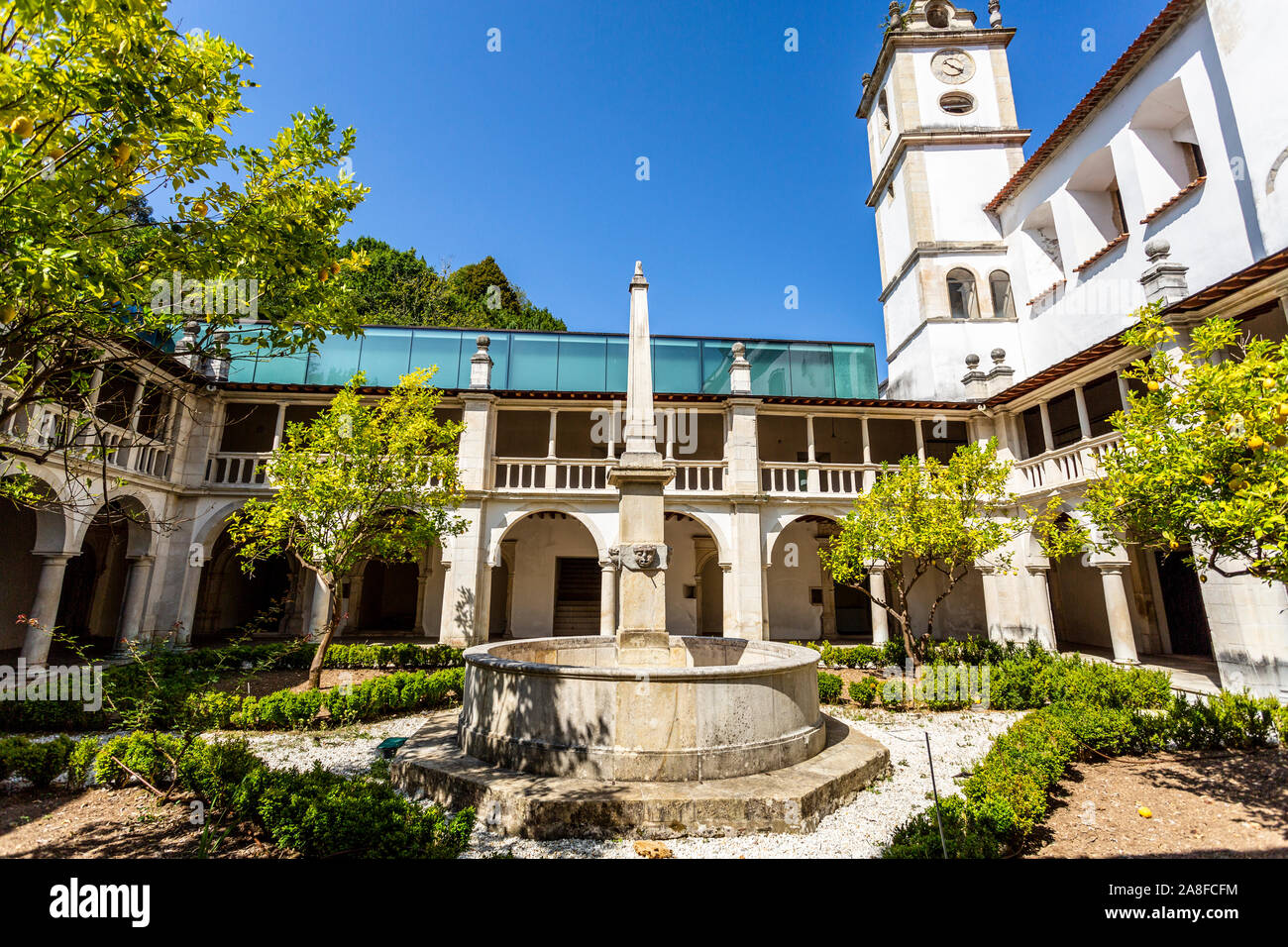 Water fountain of the Renaissance cloister of the Monastery of Saint Mary of Lorvao, Coimbra, Portugal Stock Photo