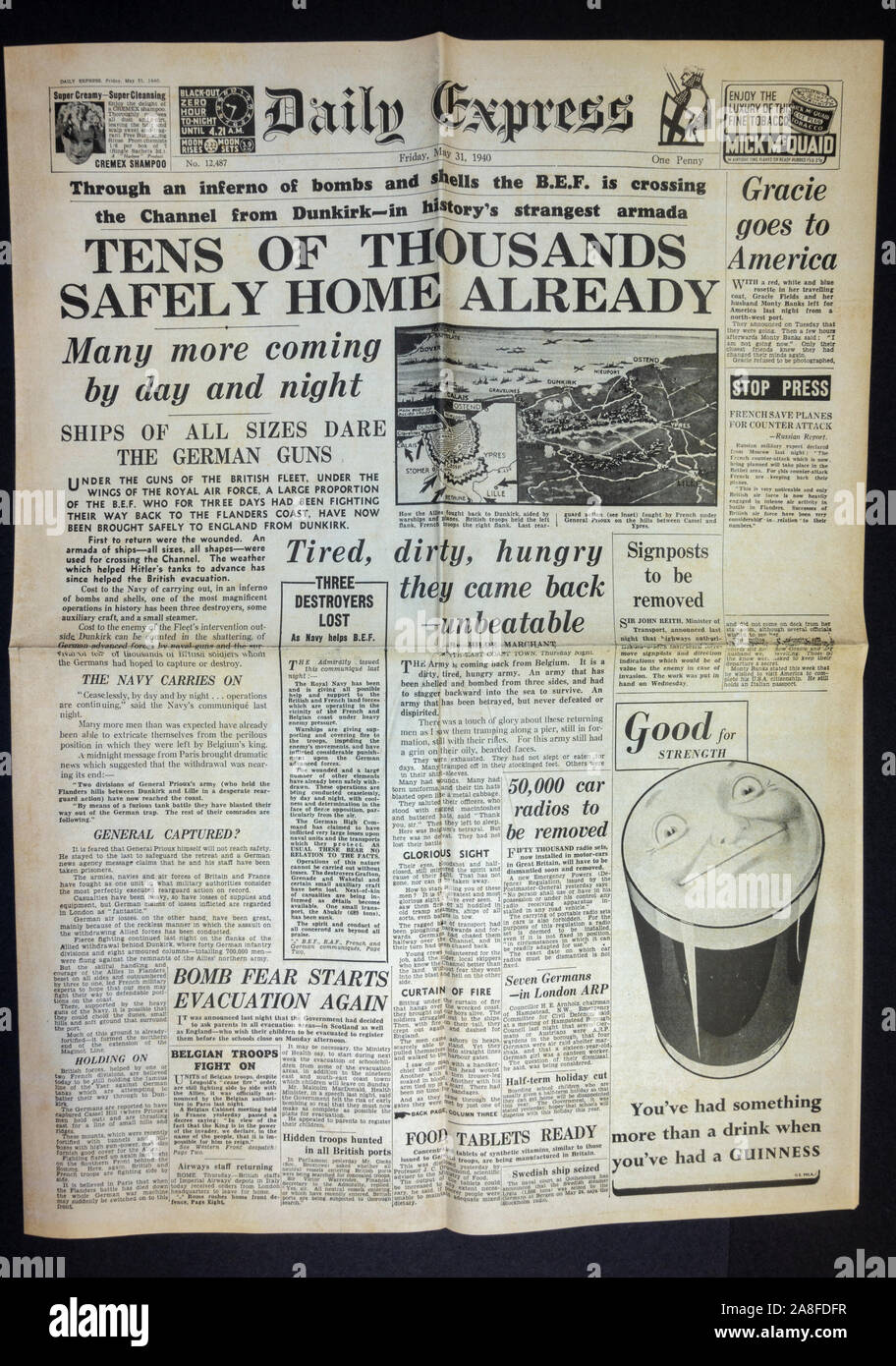 Replica of the Daily Express newspaper on 31st May 1940 showing the Dunkirk evacuation with the headline 'Tens of thousands safely home already'. Stock Photo