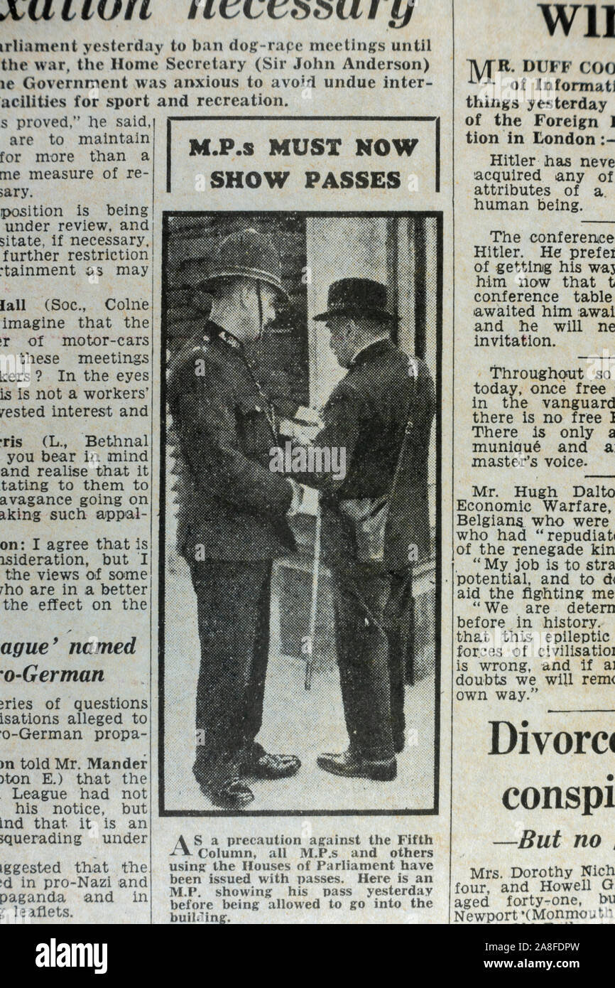 Short report showing that increased security meant that even MPs need to show ID in the Daily Express newspaper (replica) on 31st May 1940. Stock Photo