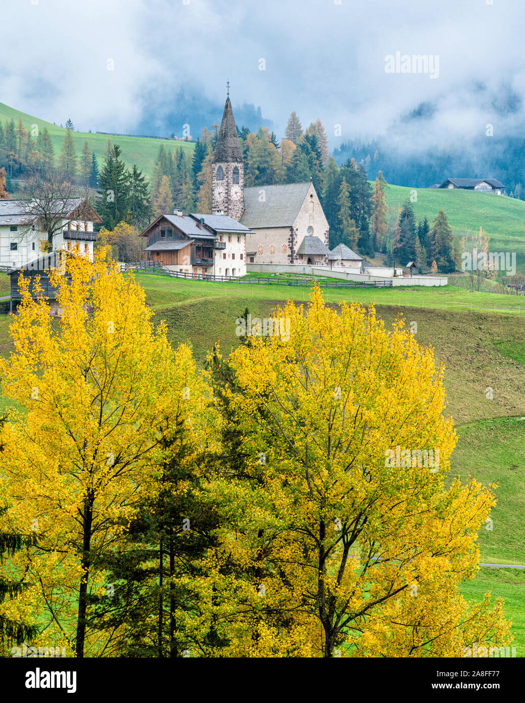 Autumnal panorama at Santa Magdalena village in the famous Val di Funes. Trentino Alto Adige, Italy. Stock Photo