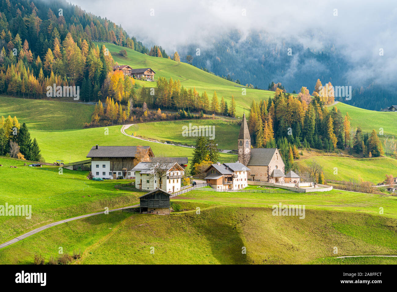 Autumnal panorama at Santa Magdalena village in the famous Val di Funes. Trentino Alto Adige, Italy. Stock Photo