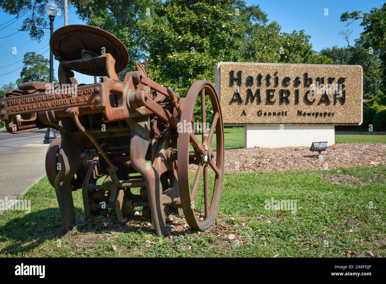 A sign for the Hattiesburg American, a Newspaper, along with a