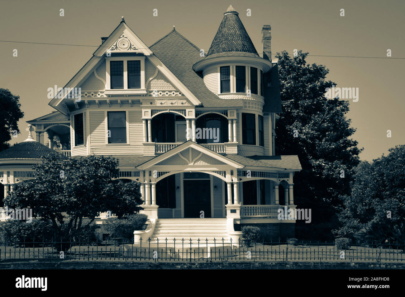 A beautiful example of a vintage Queen Anne house, with it's roofs and turret, now the Deakle Law Firm, in Hattiesburg, MS, USA Stock Photo