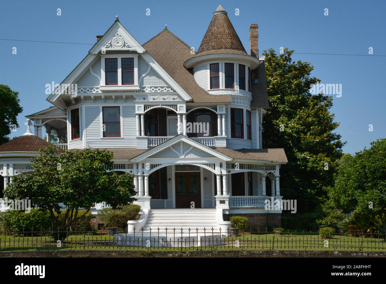 A beautiful example of a vintage Queen Anne house, with it's roofs and turret, now the Deakle Law Firm, in Hattiesburg, MS, USA Stock Photo