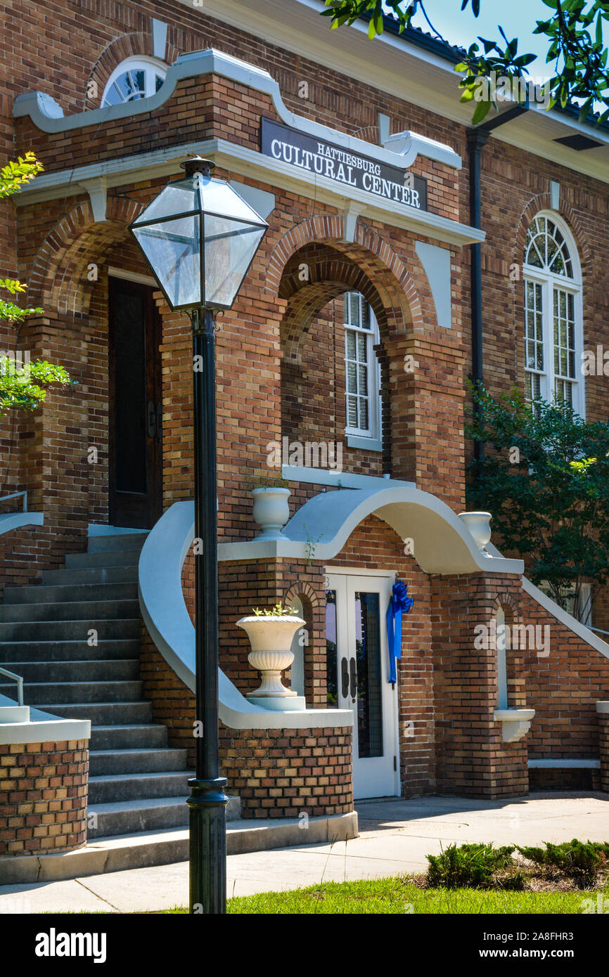 Beautiful brick building entrance up curved staircase for the