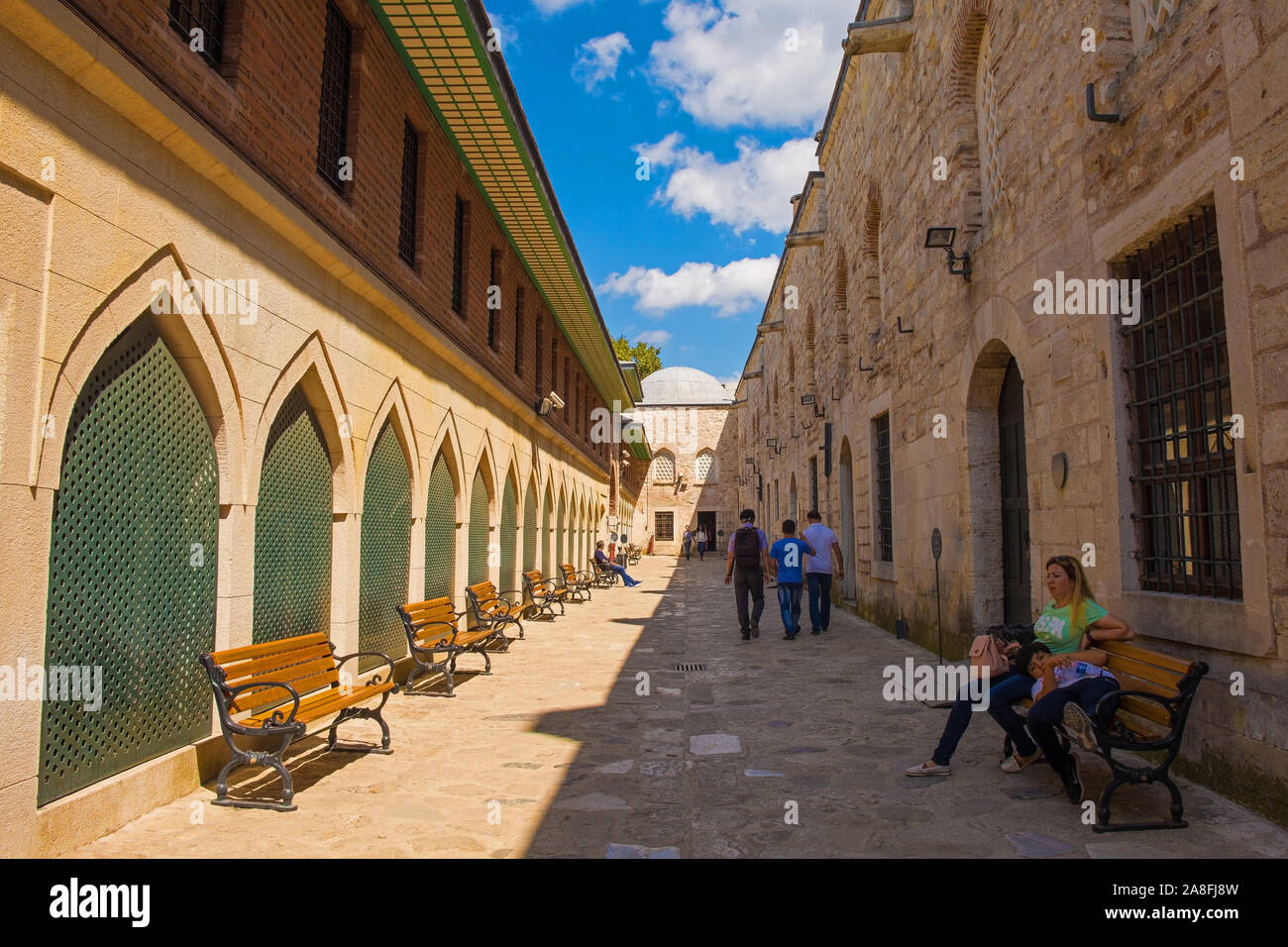 Istanbul, Turkey – September 6th 2019. Tourists in the external corridor in the Imperial Kitchens in Topkapi Palace in Istanbul, Turkey Stock Photo