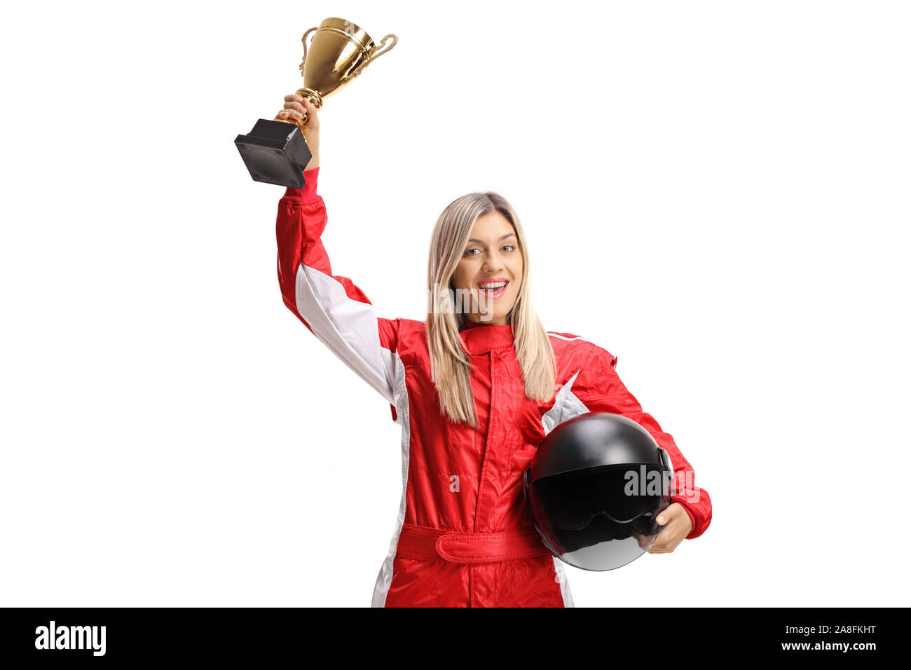 Young female car racer with a golden trophy cup isolated on white background Stock Photo