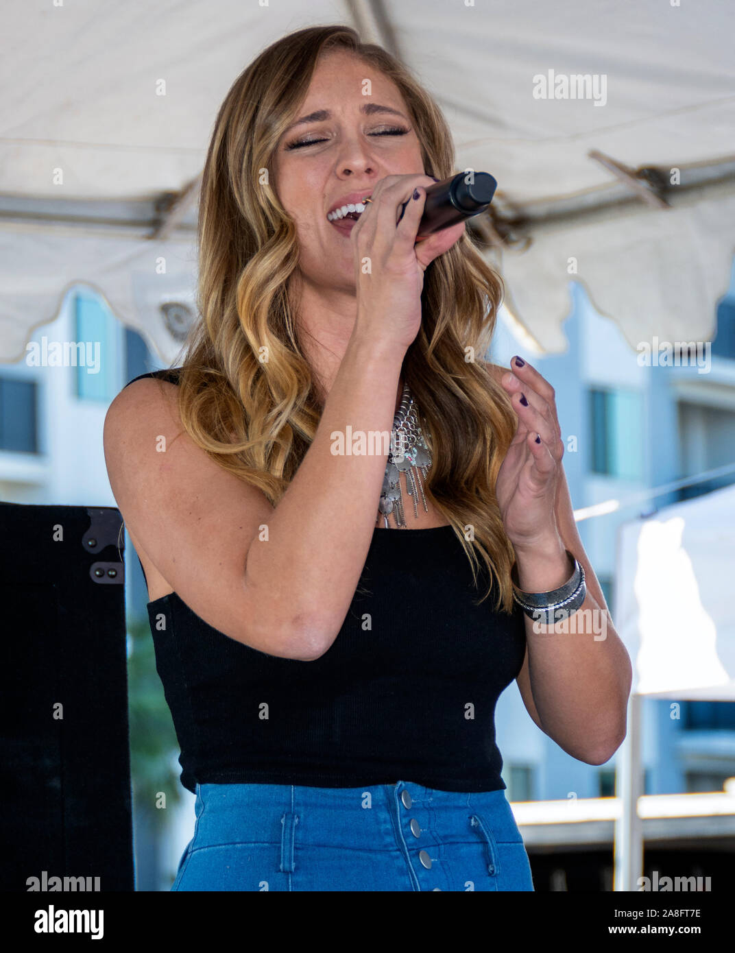 Female national anthem singer Stock Photo - Alamy