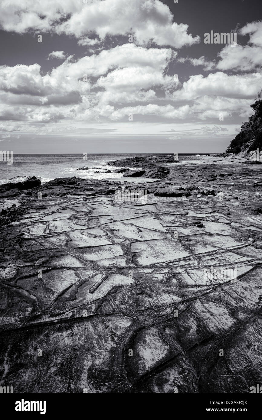 The rocky shoreline surrounding the seaside town of Lorne, Victoria ...