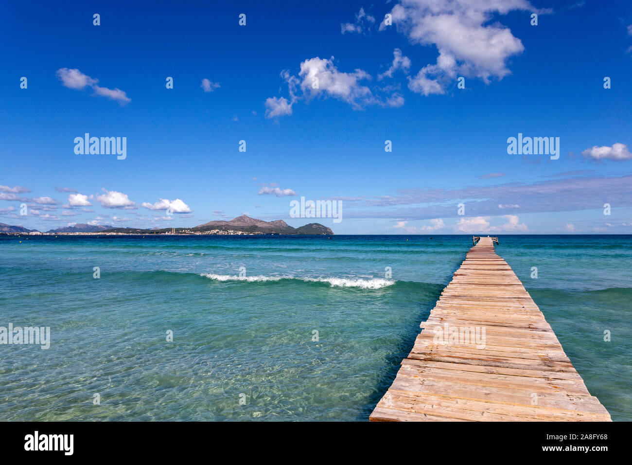 A Wooden Pier At Playa De Muro Beach In Mallorca Spain Stock