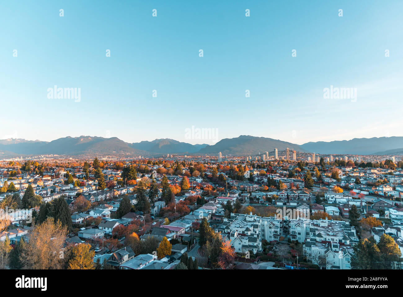 Autumn sunrise over the East Vancouver and view of downtown Brentwood