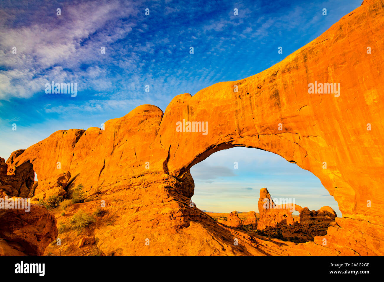 The North and South Windows and Turrest Arch at sunrise, Arches National Park, Utah   Windows Section Stock Photo