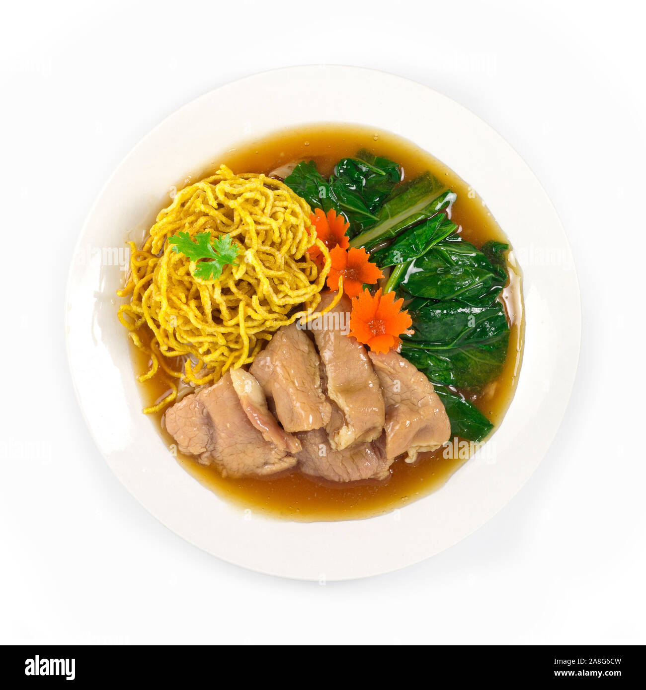 Crispy Egg Noodles with pork ,kale Chinese vegetables in gravy soy