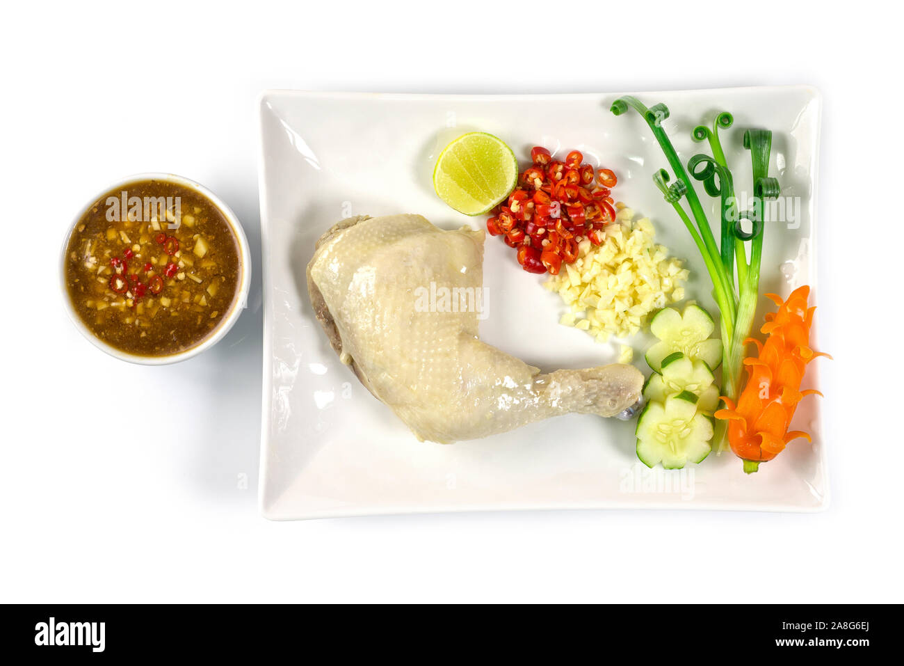 Hainanese chicken steamed with soya sauce ,chopped chili and garlic