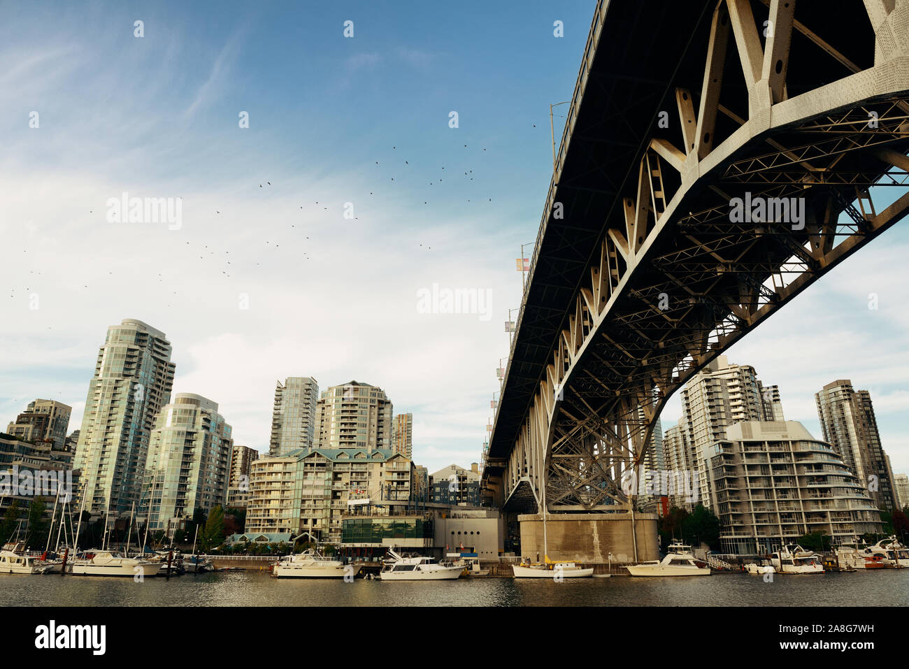 View of Vancouver downtown with bridge and apartment buildings at waterfront ...