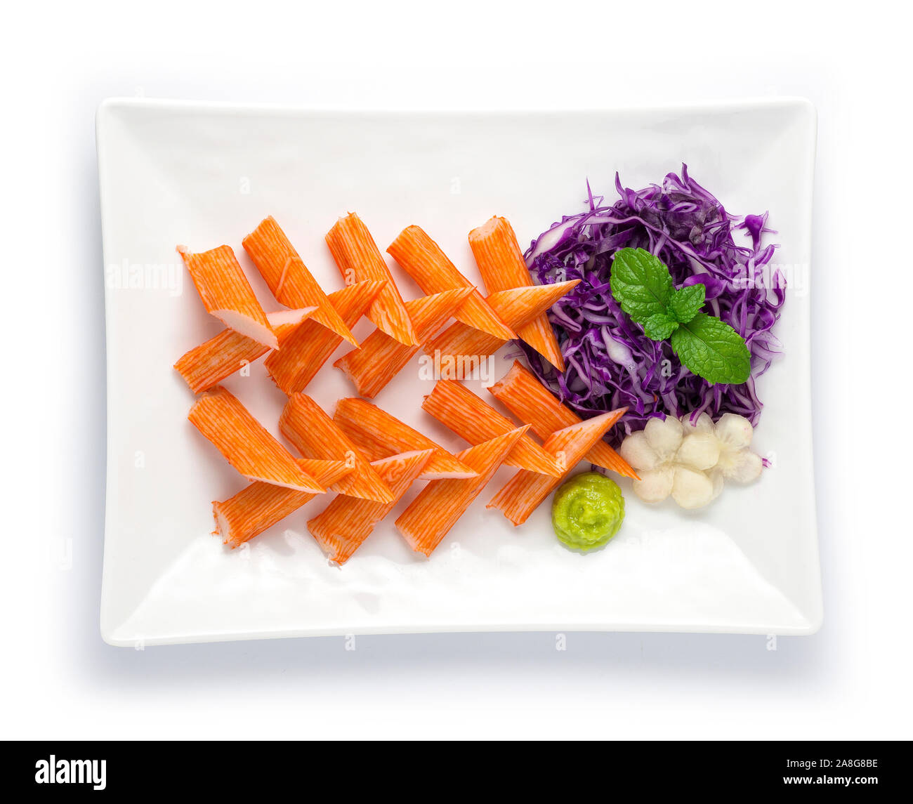 Crab Stick Set Appetizer dish with Wasabi decorate with purple cabbage