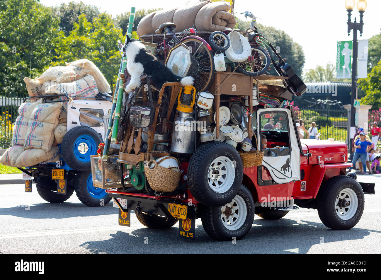 Washington DC, USA - September 21, 2019: The Fiesta DC, Willys jeeps, heavy loaded, going down constitution avenue, during the parade Stock Photo
