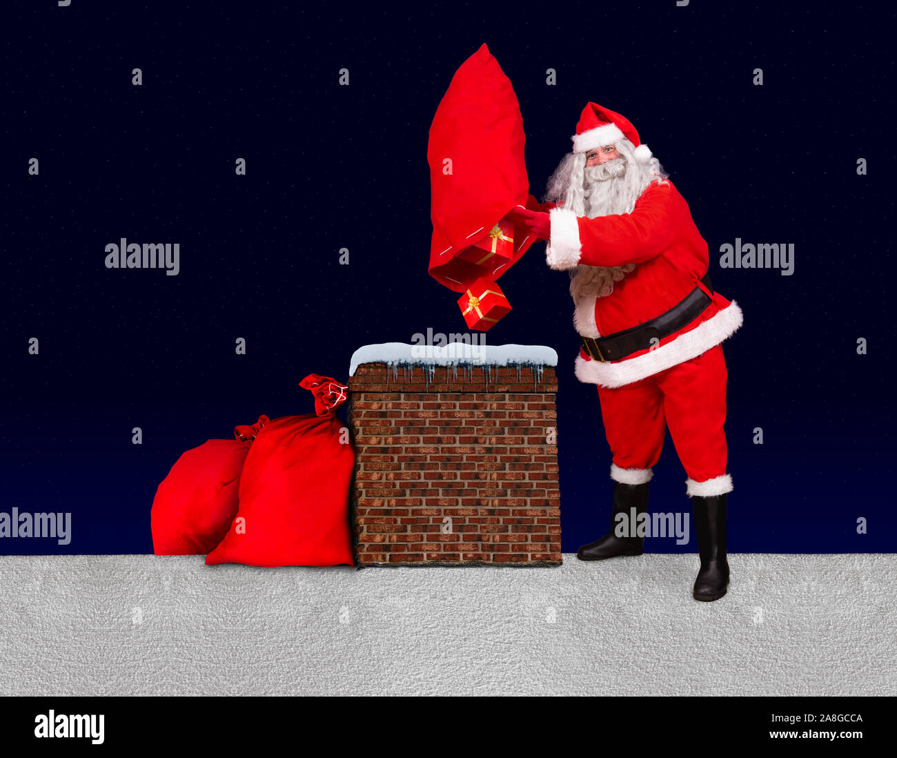 https://c8.alamy.com/comp/2A8GCCA/santa-claus-standing-at-a-snowy-roof-and-throw-gifts-from-bag-into-the-chimney-background-of-dark-blue-with-stars-santa-upturn-sack-with-christmas-b-2A8GCCA.jpg