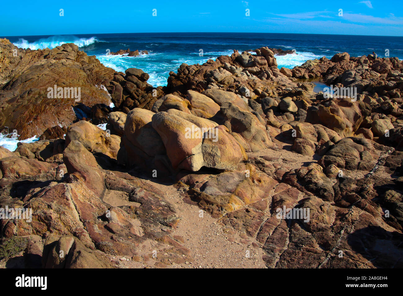 Canal Rocks Scenic views of the Indian Ocean washing over the old gneiss ...