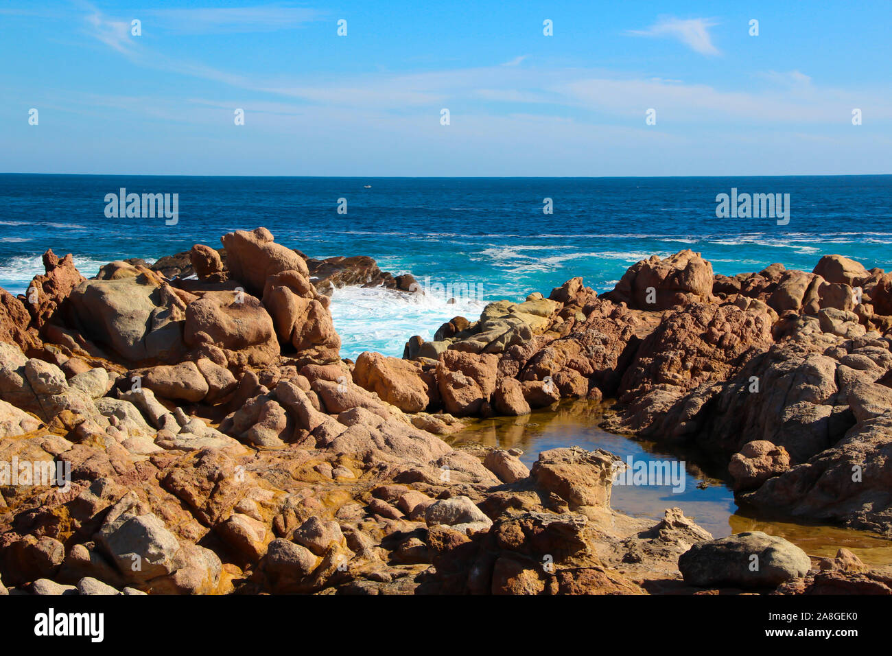 Canal Rocks Scenic views of the Indian Ocean washing over the old gneiss ...