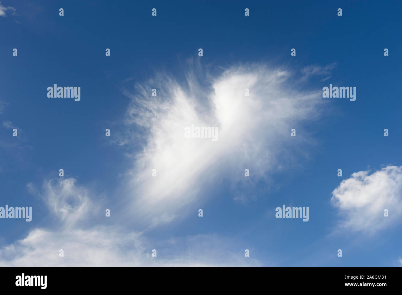 Cirrostratus Cloud at high altitude, composed of tiny ice crystals. It’s the remnant of large cumulonimbus storm clouds. Charters Towers, Queensland, Stock Photo