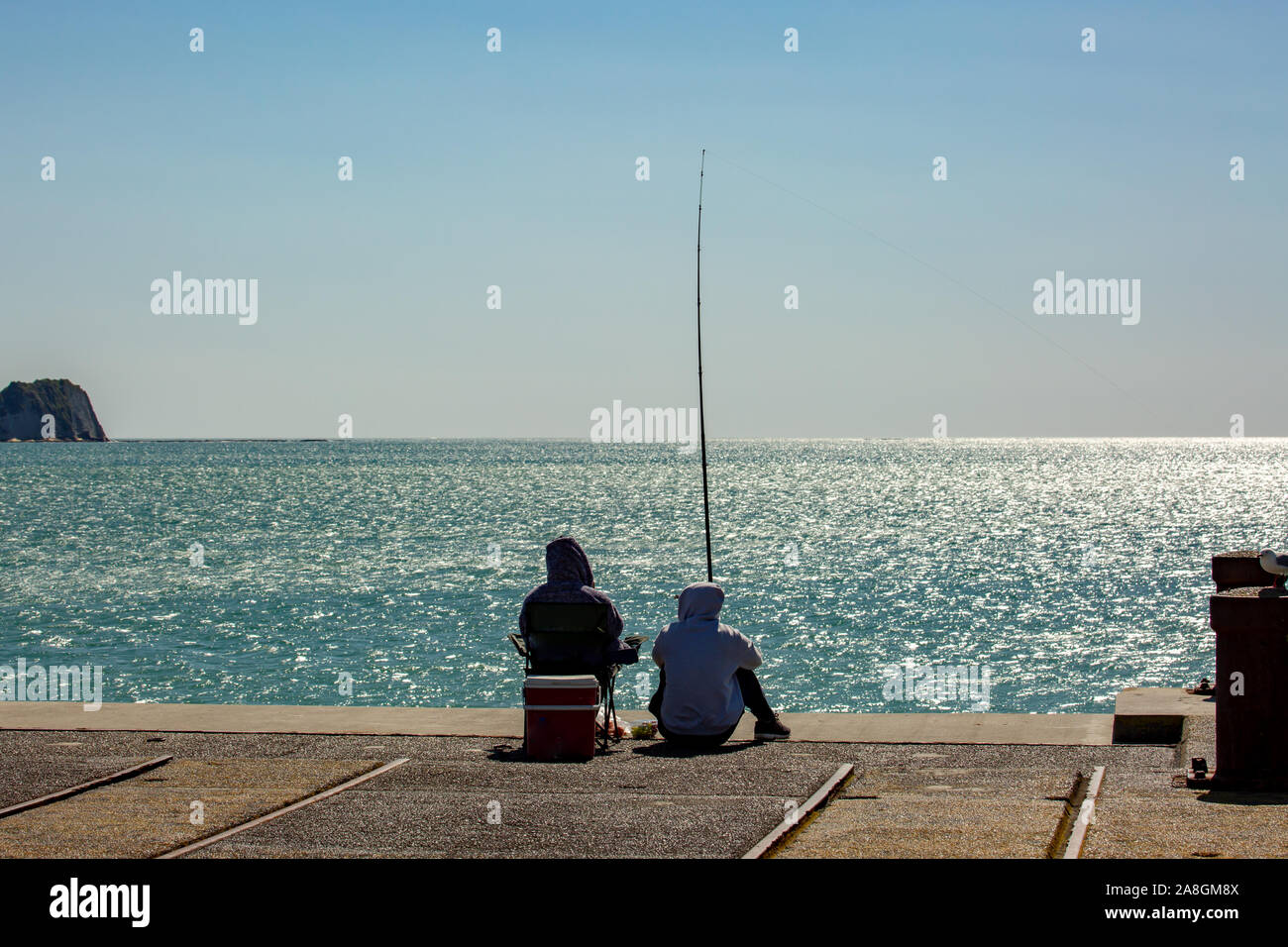 Fishing tolaga bay wharf hires stock photography and images Alamy