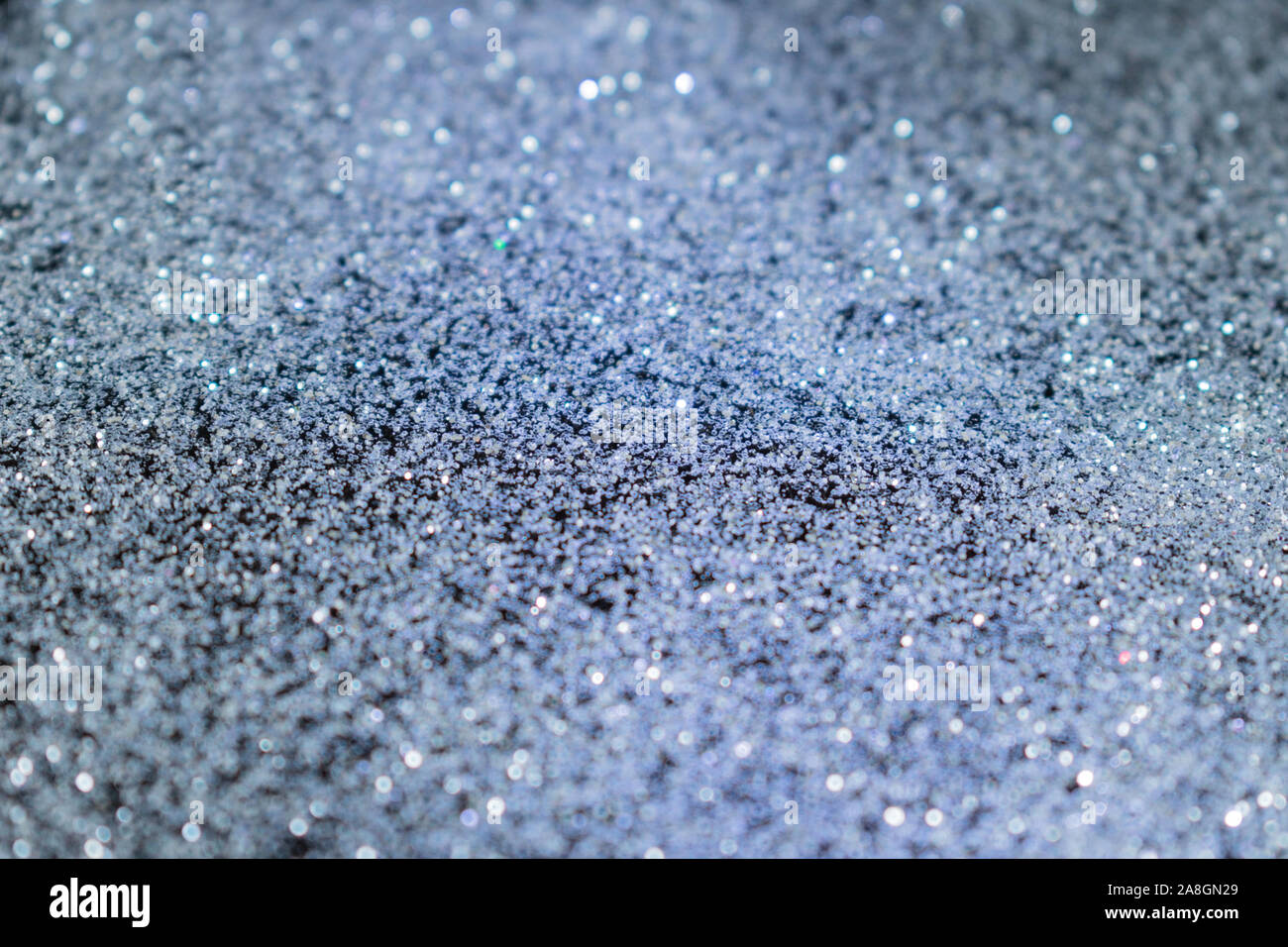 silver shiny background of small sparkles. Stock Photo