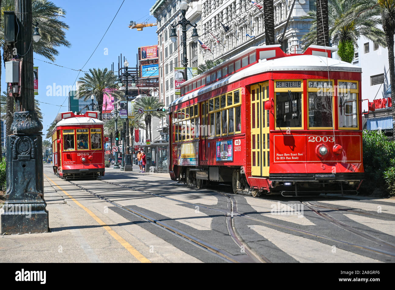 Streetcars on Canal Street in New Orleans. The historic French Quarter is a major tourist attraction. Stock Photo