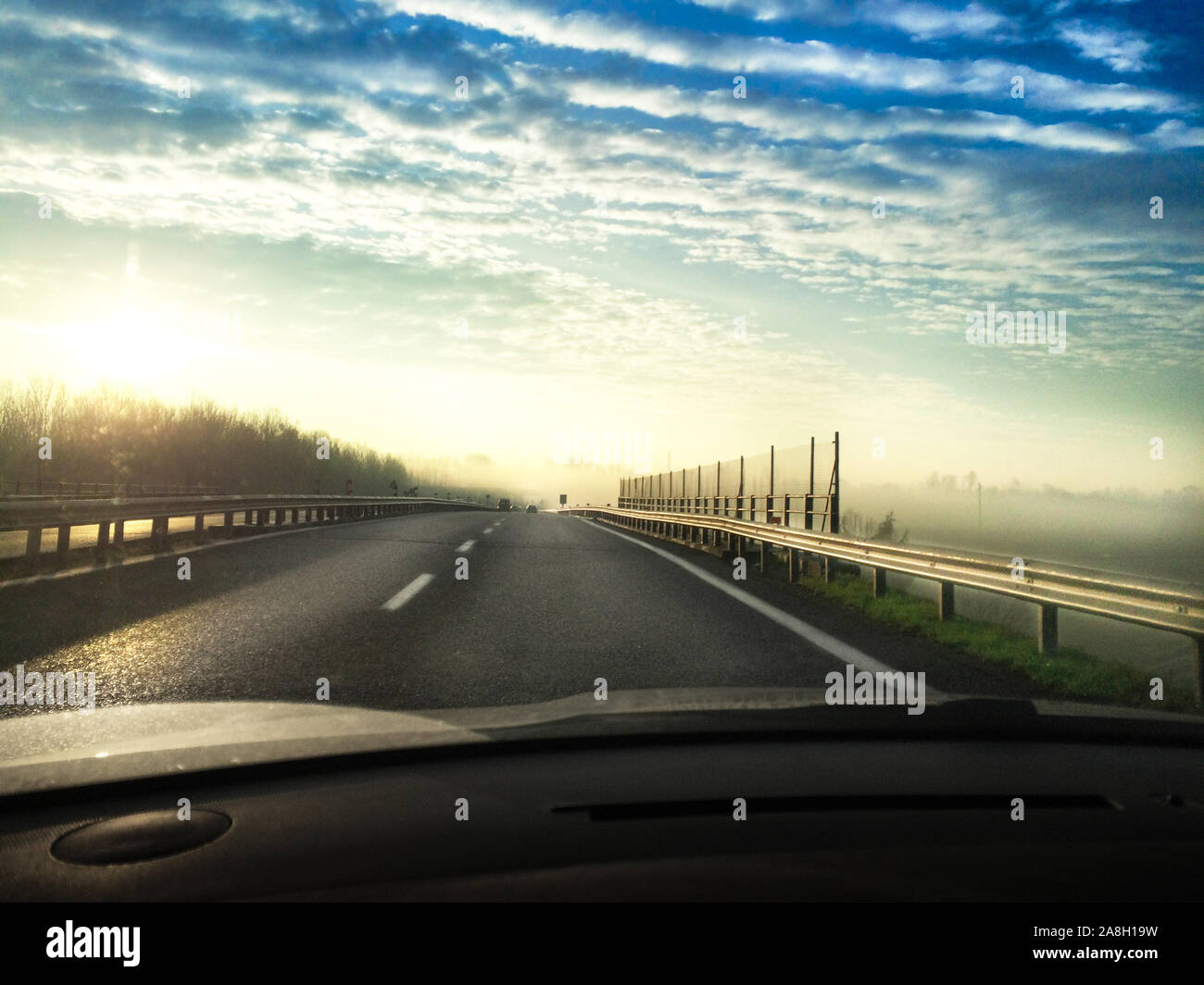 traveling in the fog in the morning Stock Photo - Alamy