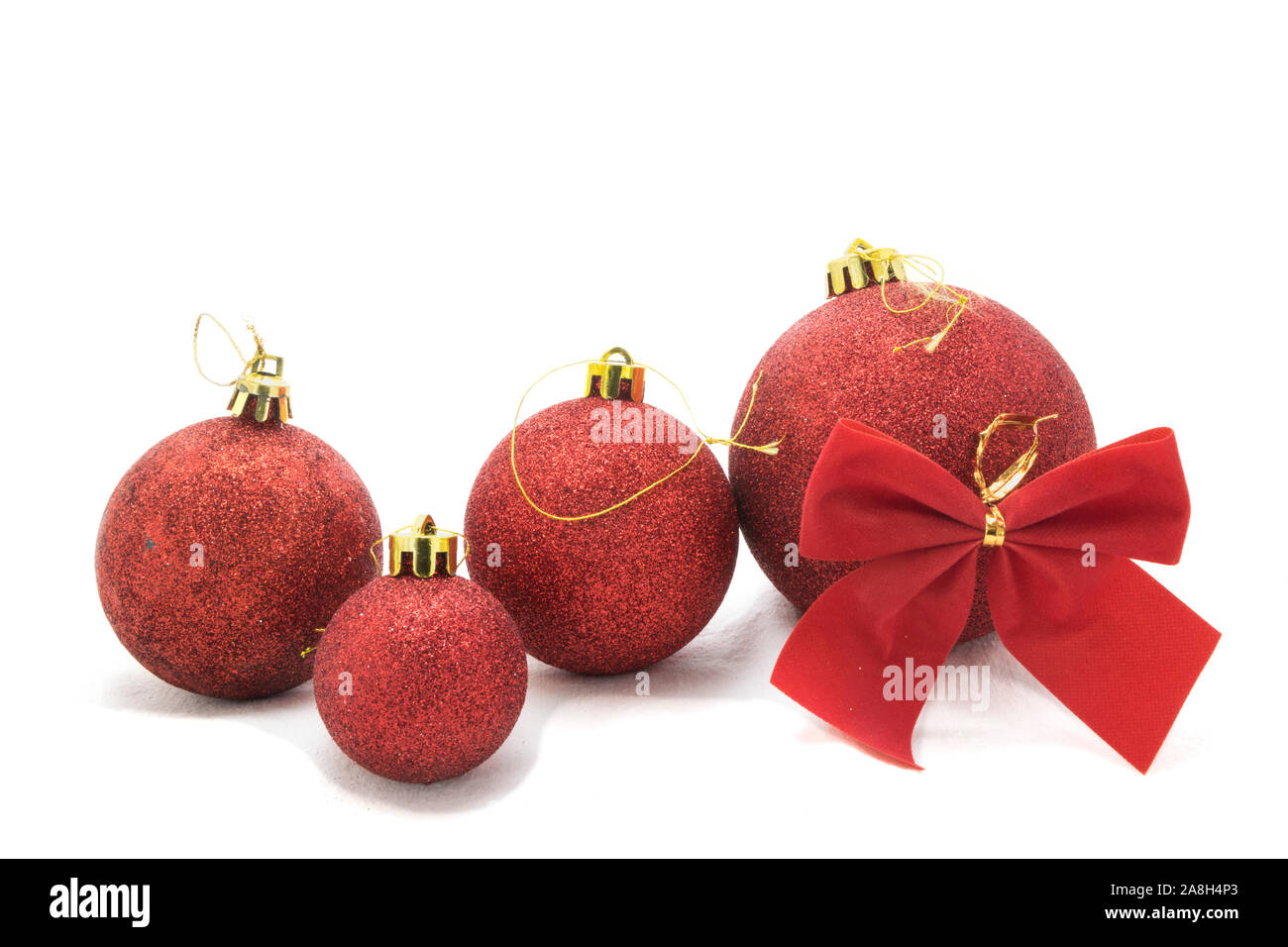 Christmas tree decoration: baubles, ribbons isolated on white background. Stock Photo