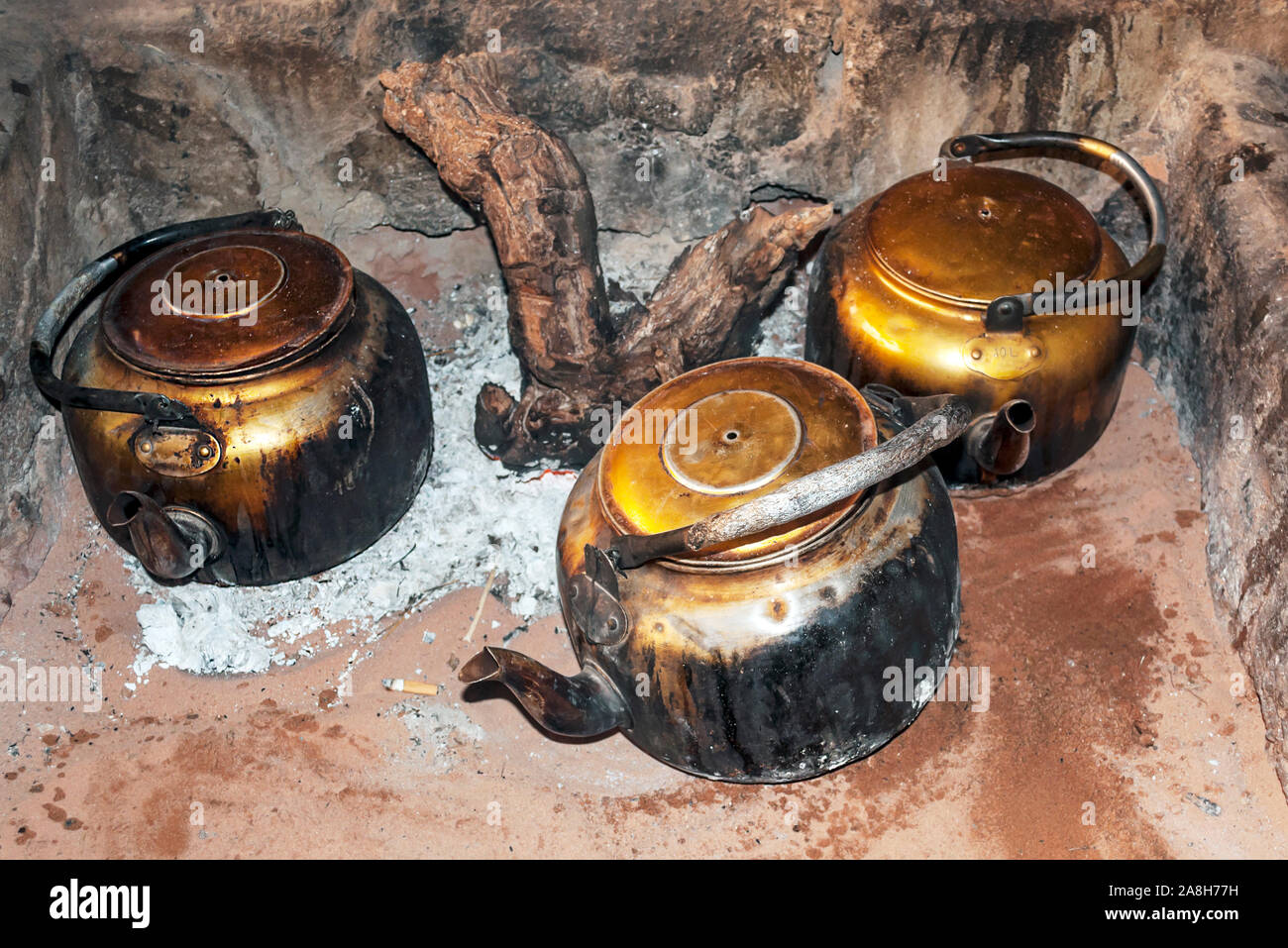 Coffee makers in Jordan surrounded by carpets Stock Photo Alamy