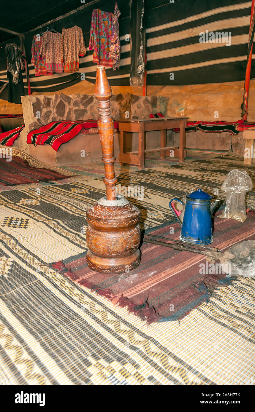 Coffee makers in Jordan surrounded by carpets Stock Photo Alamy