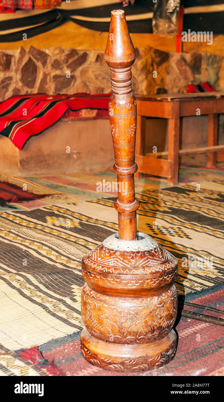 Coffee makers in Jordan surrounded by carpets Stock Photo Alamy