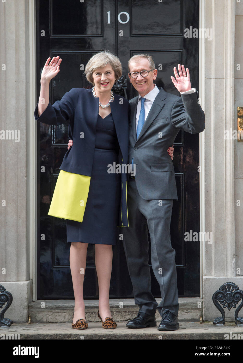Theresa May and husband Philip arriving in Downing Street for the first time as Prime Minister after her election as leader by conservative members following the resignation of David Cameron. Picture David Parker 13/7/2016 Stock Photo