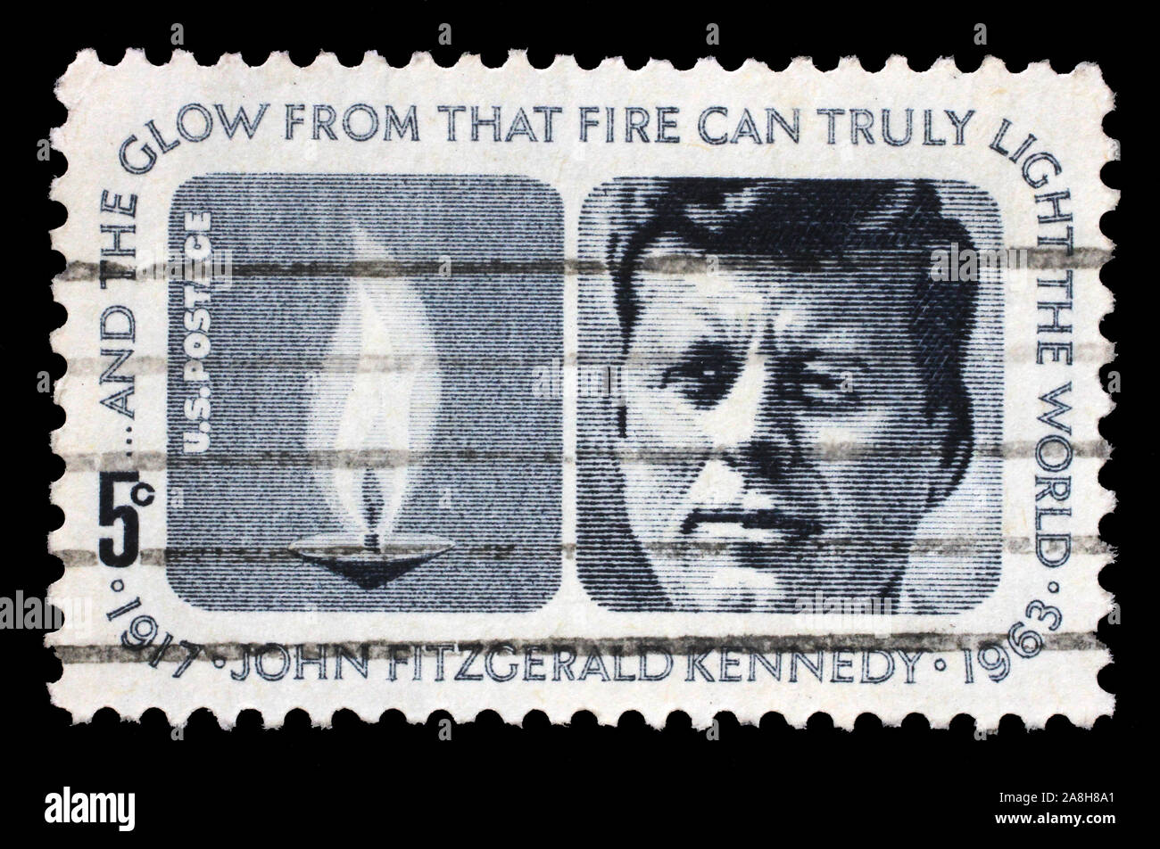 Stamp printed in USA shows President John Fitzgerald Kennedy, circa 1964 Stock Photo