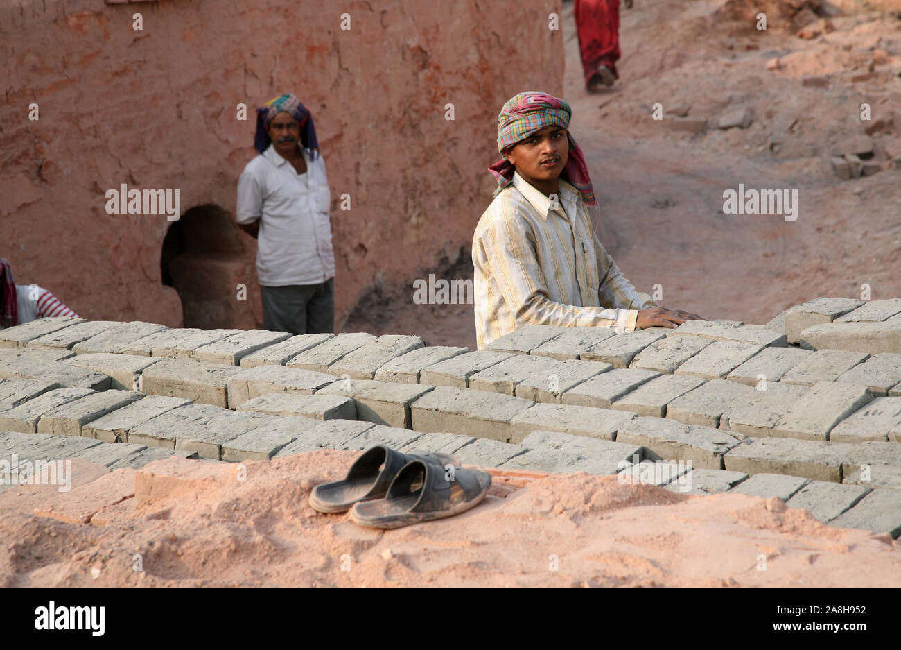 Brick factory. Tools and machines for making bricks are very rudimentary, Sarberia, West Bengal, India. Stock Photo