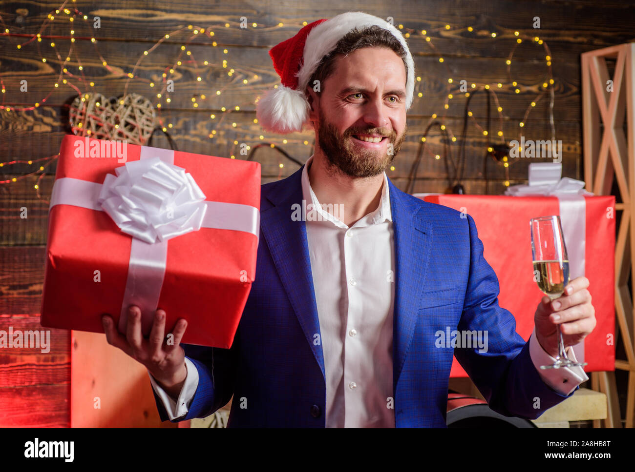 Christmas gift from colleague. Tradition giving gifts. Businessman excited  face hold gift box. Secret santa office tradition. Celebrate christmas corp  Stock Photo - Alamy