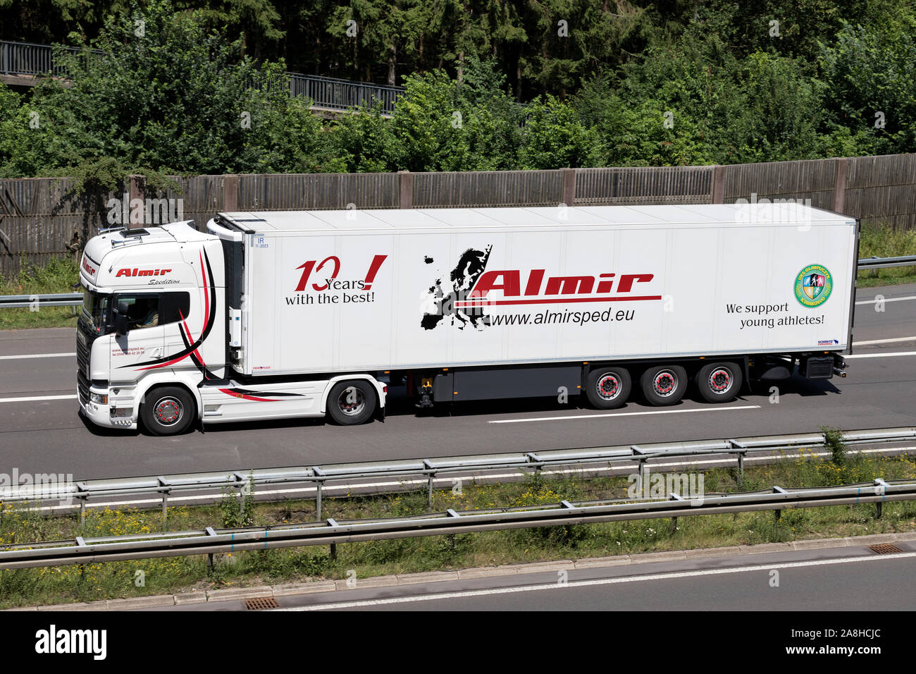 Almir Scania truck with temperature controlled trailer on motorway. Stock Photo