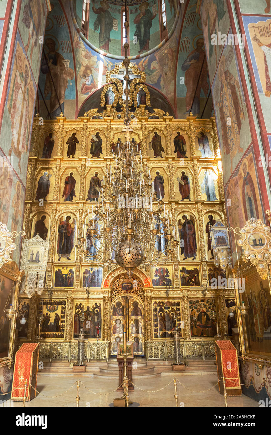SERGIEV POSAD, MOSCOW REGION, RUSSIA - MAY 10, 2018: Trinity Lavra of St. Sergius, interior of the Assumption Cathedral. Five-tier iconostasis with an Stock Photo