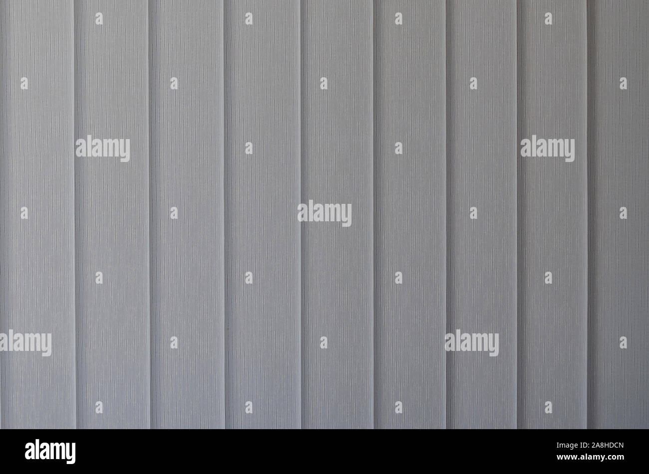 Windows with closed blinds on new building Stock Photo