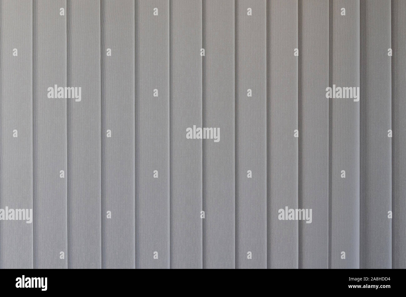 Windows with closed blinds on new building Stock Photo