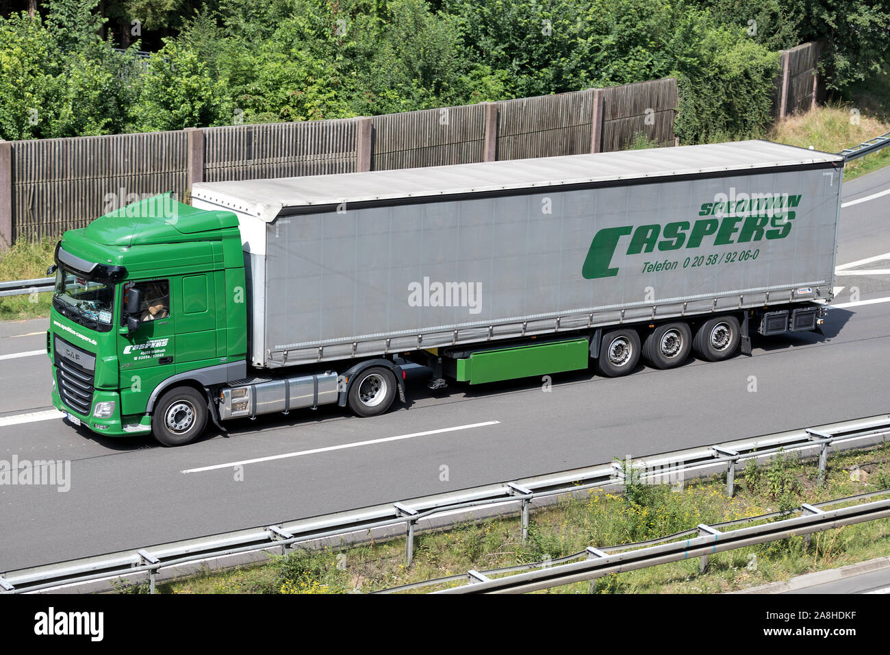 DAF XF truck with Dachser curtainside trailer on motorway Stock Photo -  Alamy