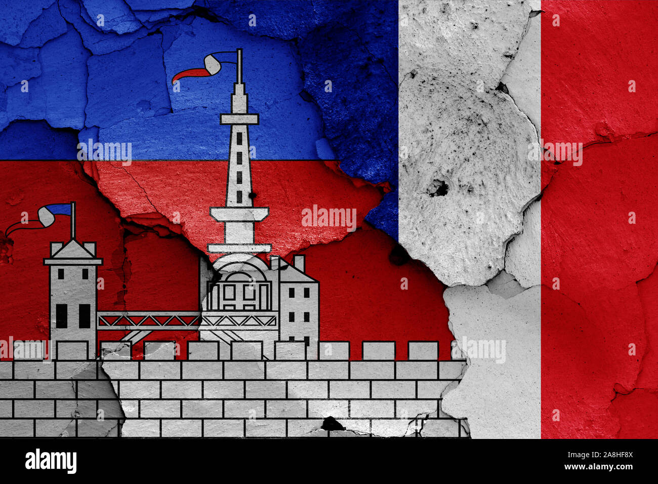 flags of Malakoff and France painted on cracked wall Stock Photo