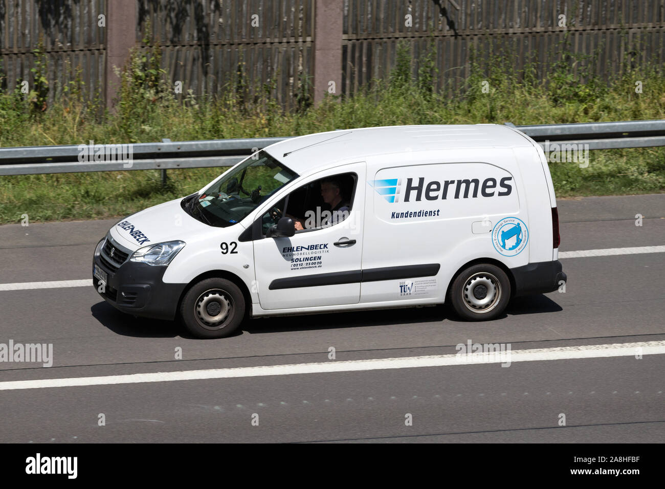 Hermes Kundendienst van on motorway. Hermes is Germany’s largest post-independent provider of deliveries to private customers. Stock Photo