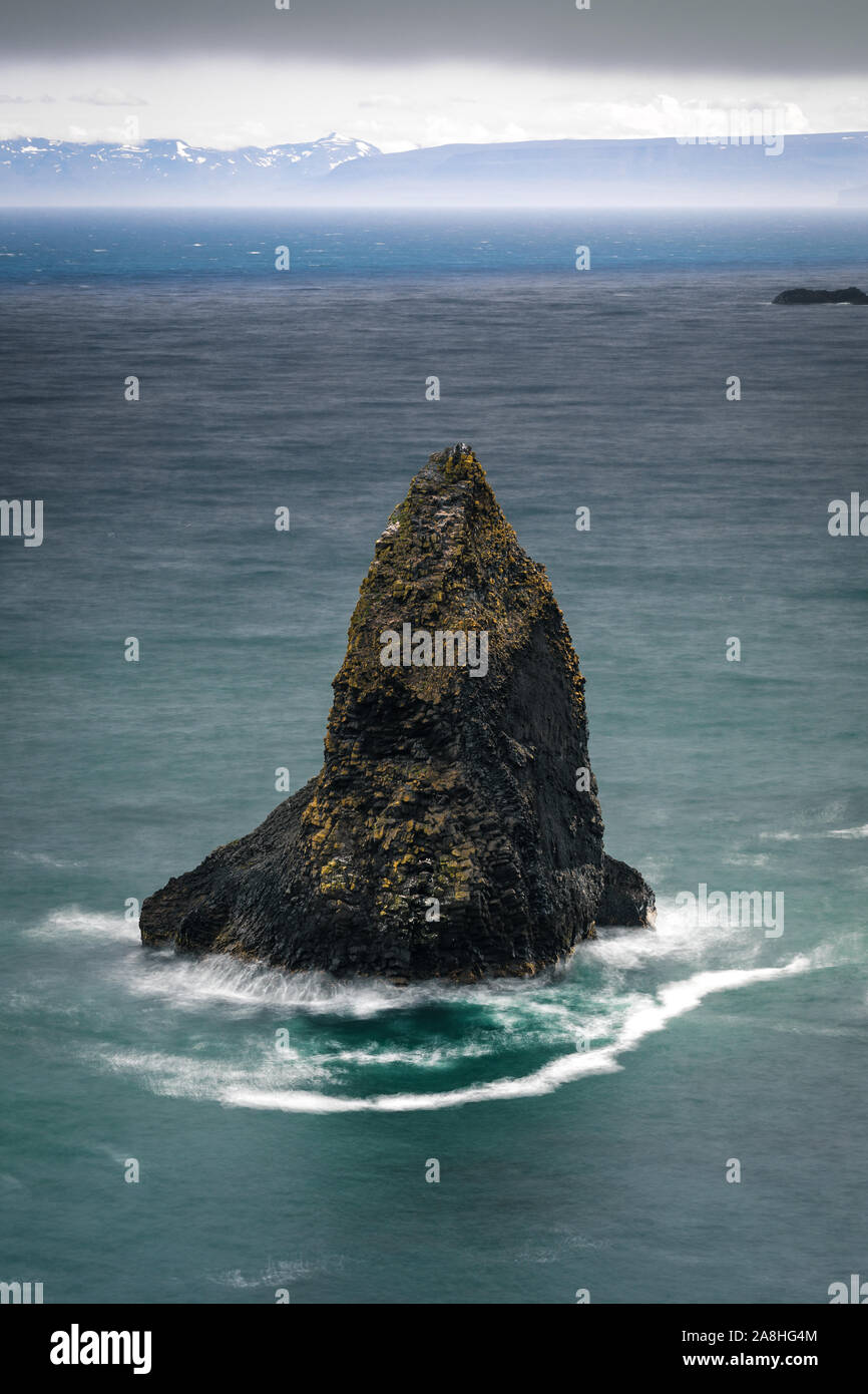This is a wonderful sea stack of the remote Westfjords in Iceland Stock Photo