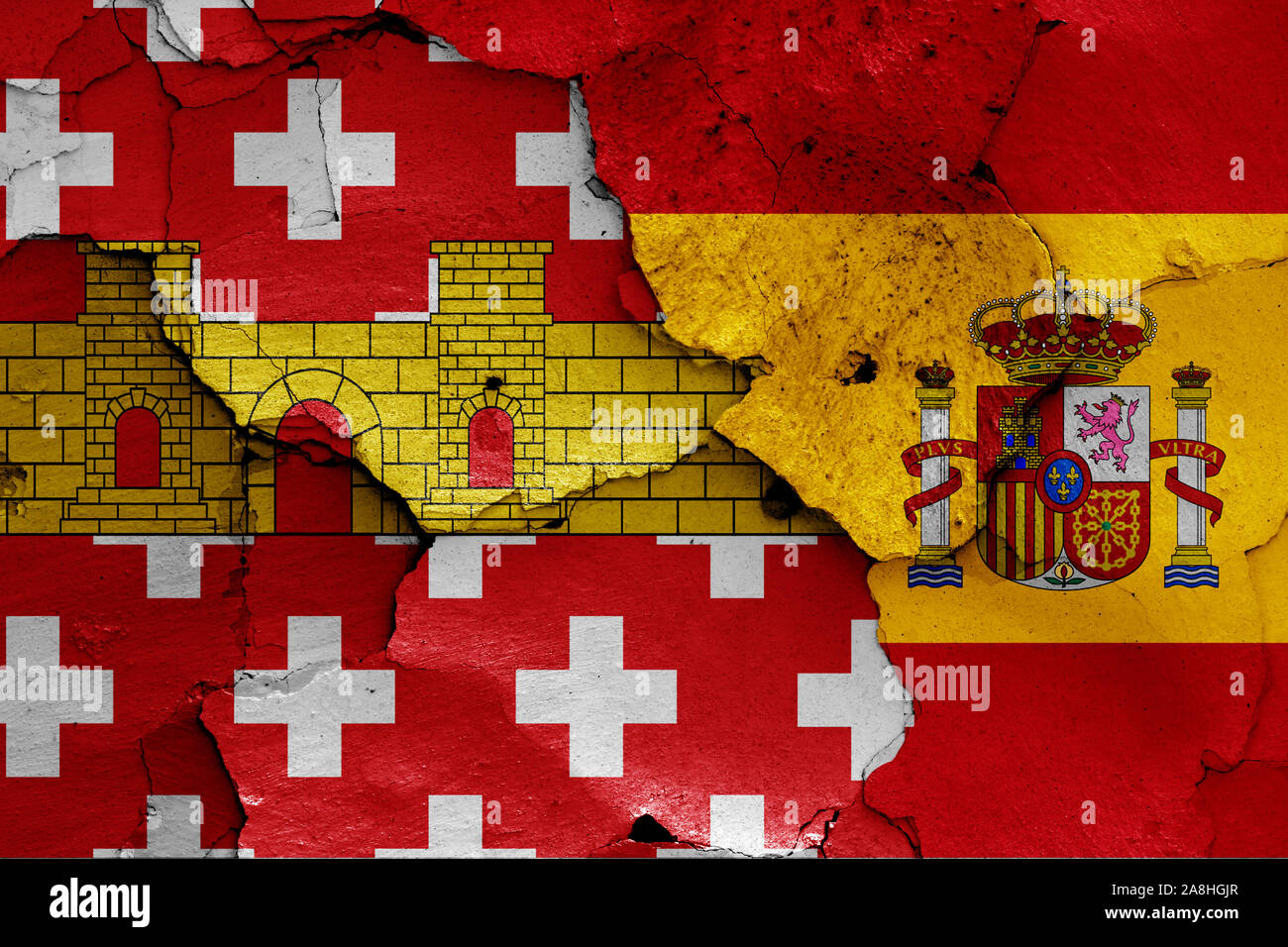 flags of Regencos and Spain painted on cracked wall Stock Photo